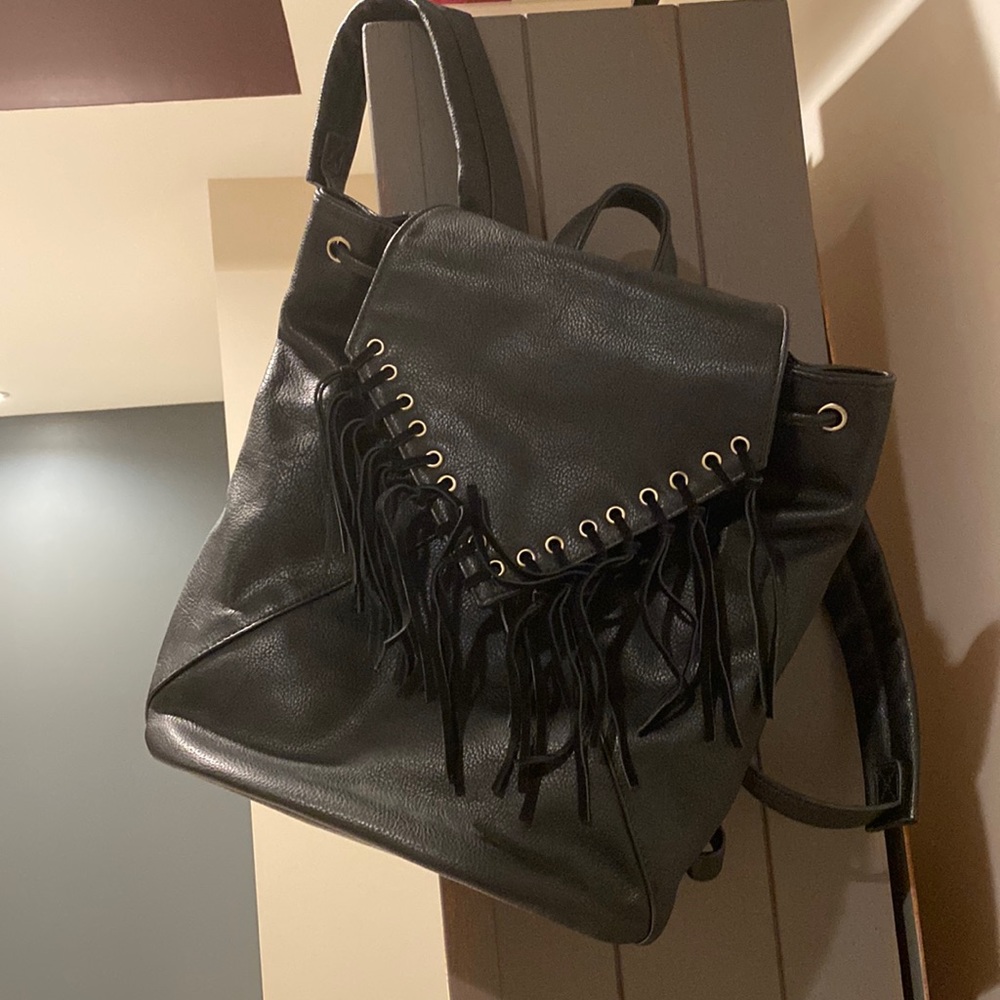 EUC, black fringe adjustable pleather back pack -holds 13” laptop